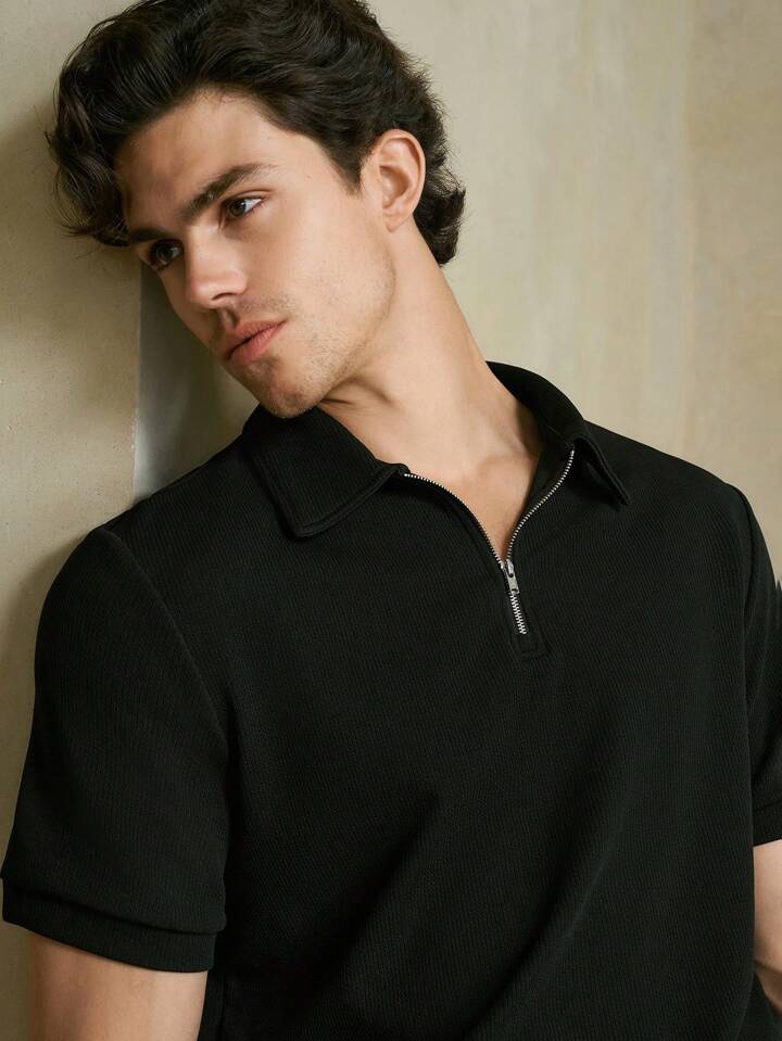 BLACK KNITTED ZIPPER POLO